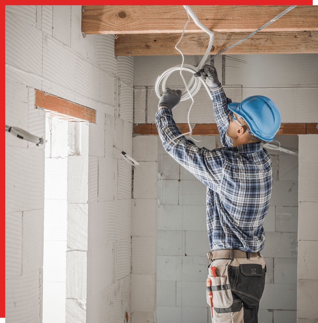 A professional doing a commercial electrical repair in Jacksonville, FL